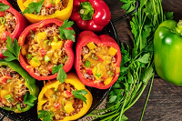 Simple Stuffed Peppers overhead view of red, yellow and green stuffed bell peppers