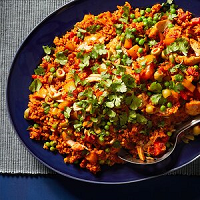 Slow Cooker Arroz Pollo (Chicken & Rice) chicken and rice in a dish