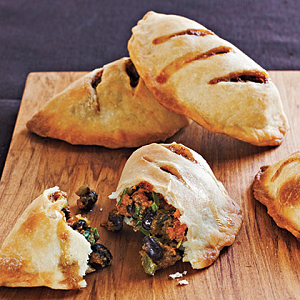 empanadas on a cutting board