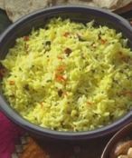 Rice pilaf with lime and cashews in a bowl