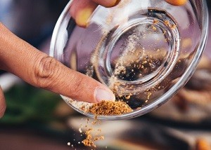 Easy Homemade Popcorn Seasonings a small bowl of seasoning