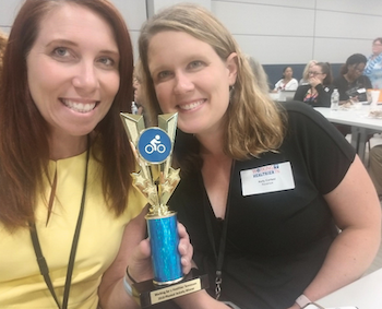 Abby and Kelly with a wellness council award Abby and Kelly with a wellness council award