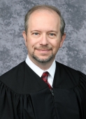 Headshot of Judge Conner