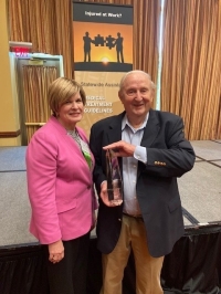 Abbie Hudgens, the BWC Administrator, presented Bob Pitts with the 2022 Sue Ann Head Award for Excellence in Workers' Compensation. Abbie Hudgens, the BWC Administrator, presented Bob Pitts with the 2022 Sue Ann Head Award for Excellence in Workers' Compensation.