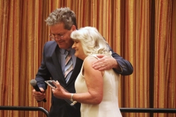 troy_and_kitty_sah_web Administrator Troy Haley hugging Kitty Boyte as he hands her the trophy