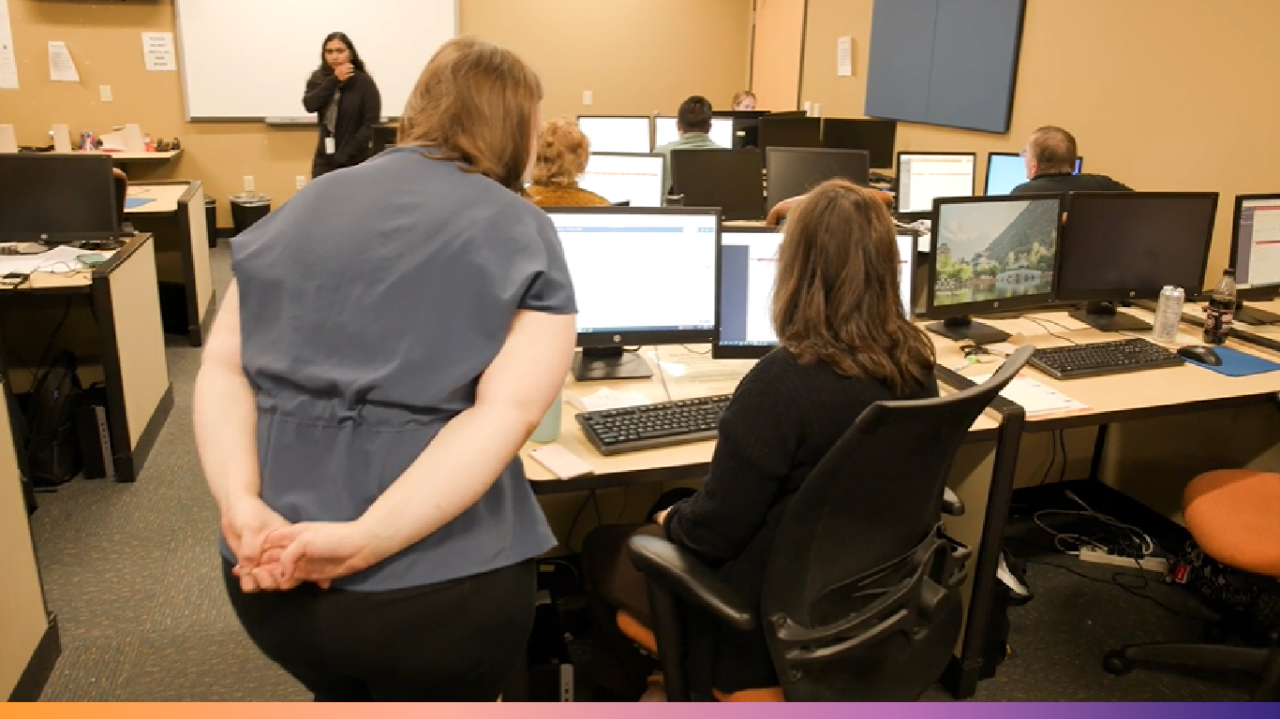 FAST employees work with UI staff members FAST Enterprises employees work with Unemployment Insurance (UI) staff members