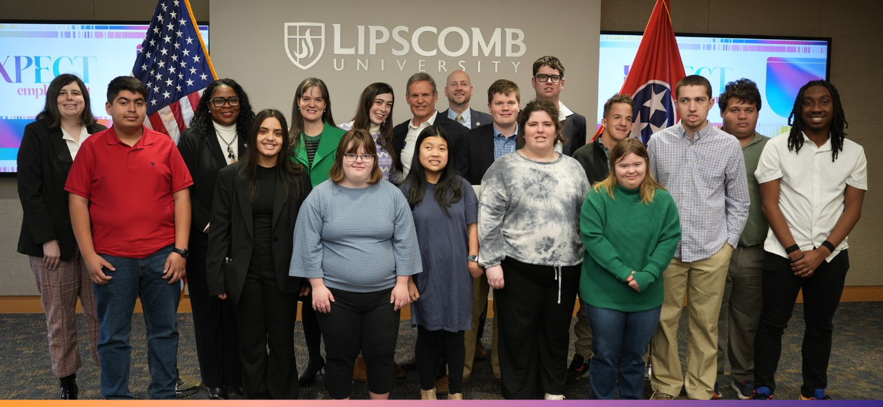 Expect Employment presentation Gov. Bill Lee stands with state leaders and a group of students in front of a Lipscomb University sign