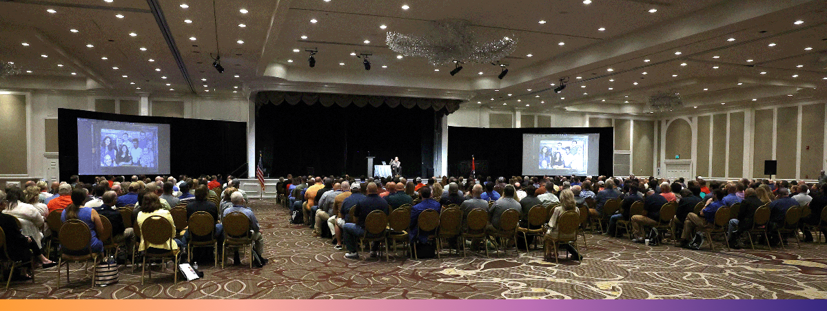 Tennessee Safety & Health Conference 2024 Large room of people listen to a speaker who is in a wheelchair on stage